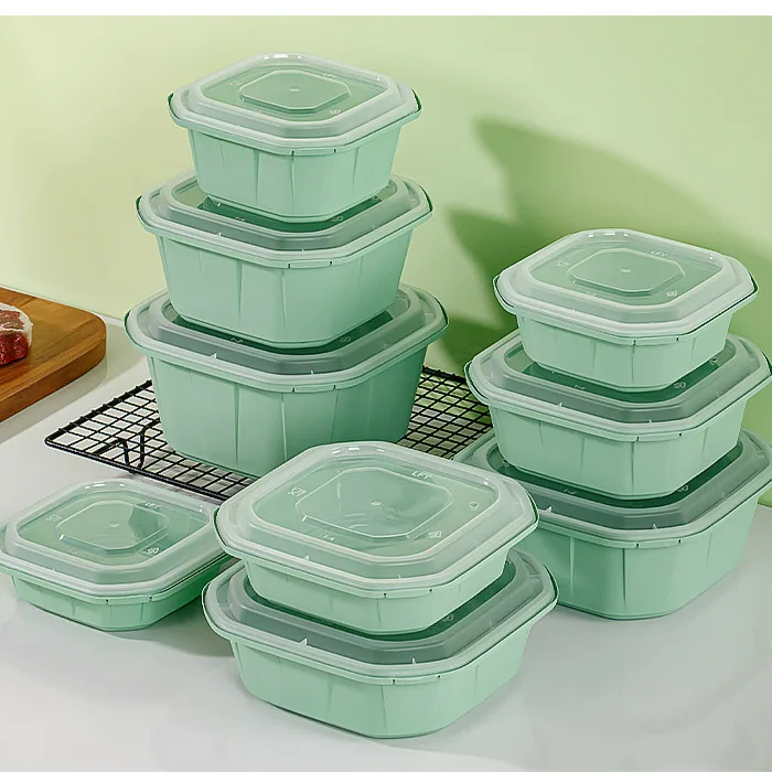 Plastic takeaway food container with meal and yellow lid
