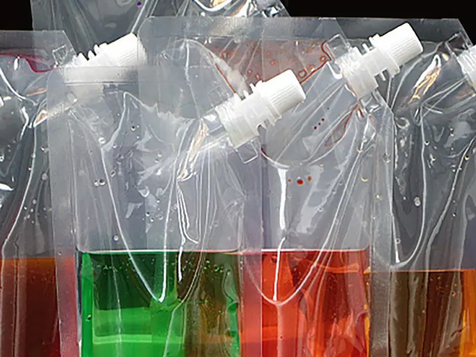 Real portable spout pouch shown as a closure and dispensing reference