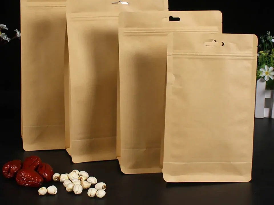 Plain kraft flat-bottom coffee bag samples in several sizes