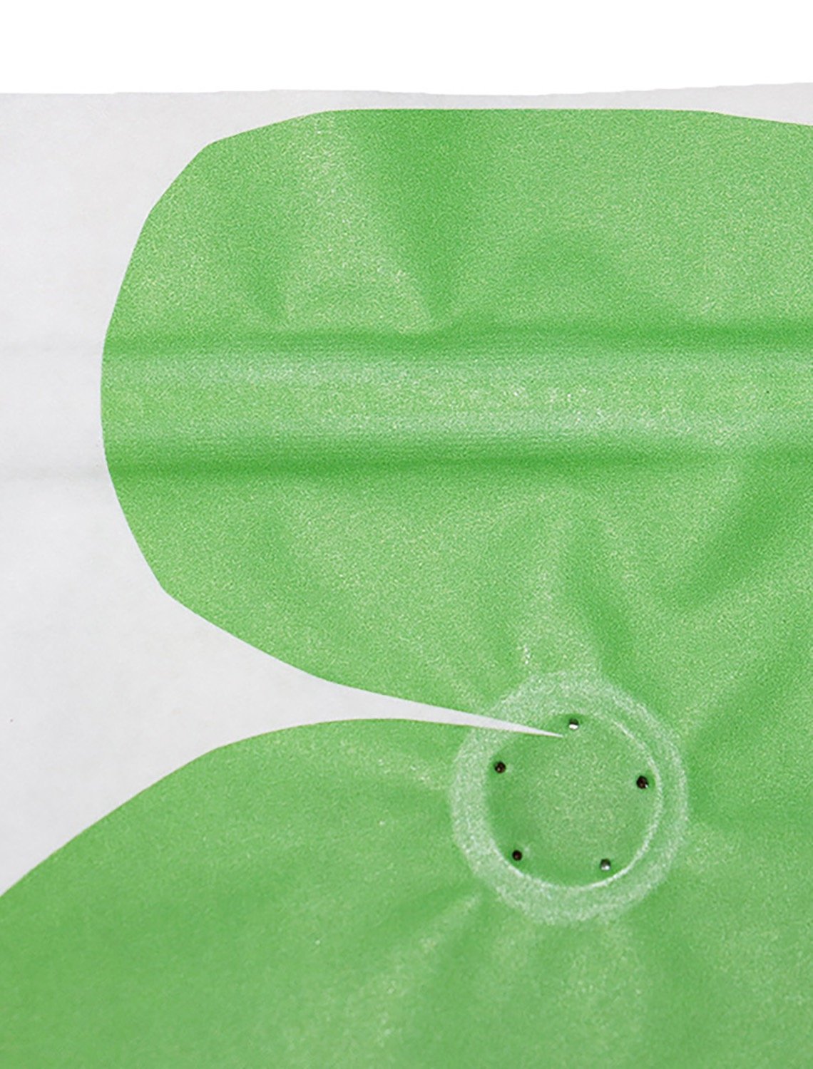 Close-up of the exterior form of a valve on a coffee pouch